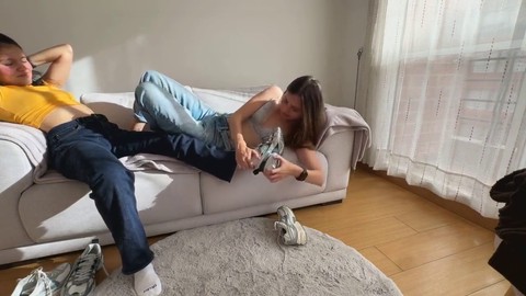 Two hot lesbians get down in a sweaty foot wrestling match